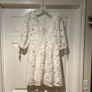 Storia White Lace Dress with Floral Design